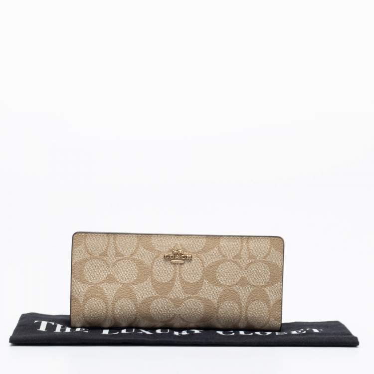 Pre Owned Coach Beige Signature Coated Canvas Long Slim Bifold Wallet