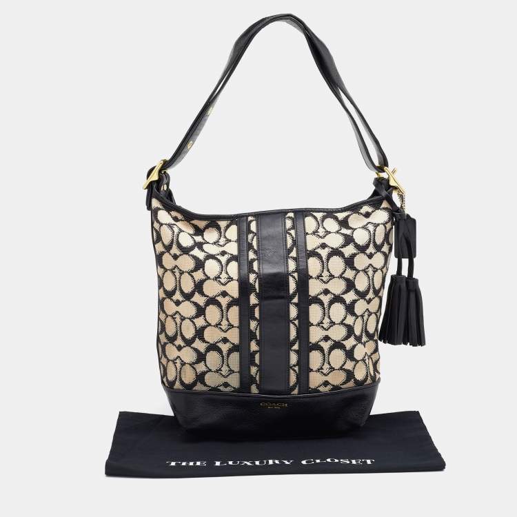 Pre Owned Coach Beige/Black Signature Canvas and Leather Hobo