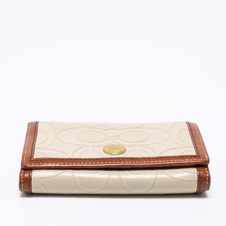 Pre Owned Coach Off White/Brown Signature Leather Trifold Compact Wallet