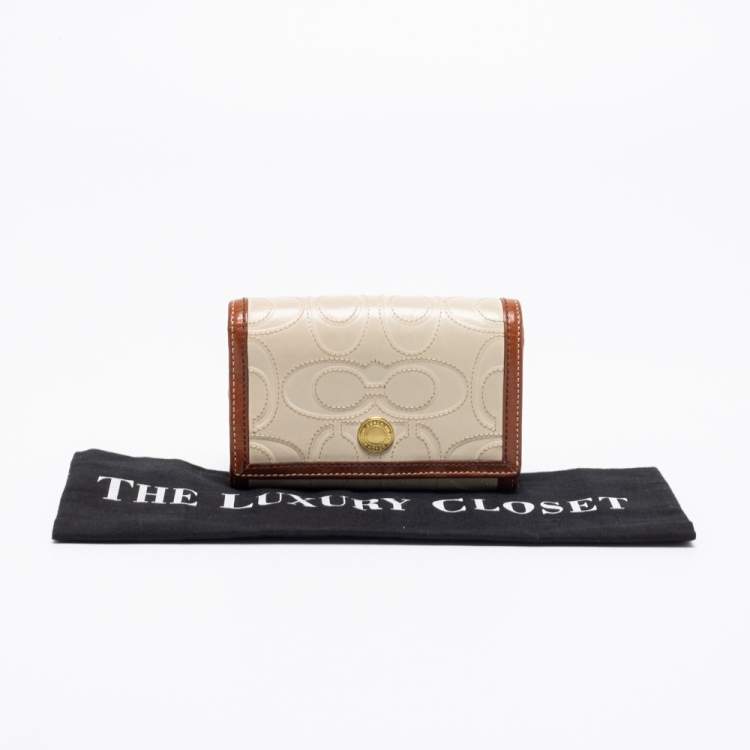 Pre Owned Coach Off White/Brown Signature Leather Trifold Compact Wallet