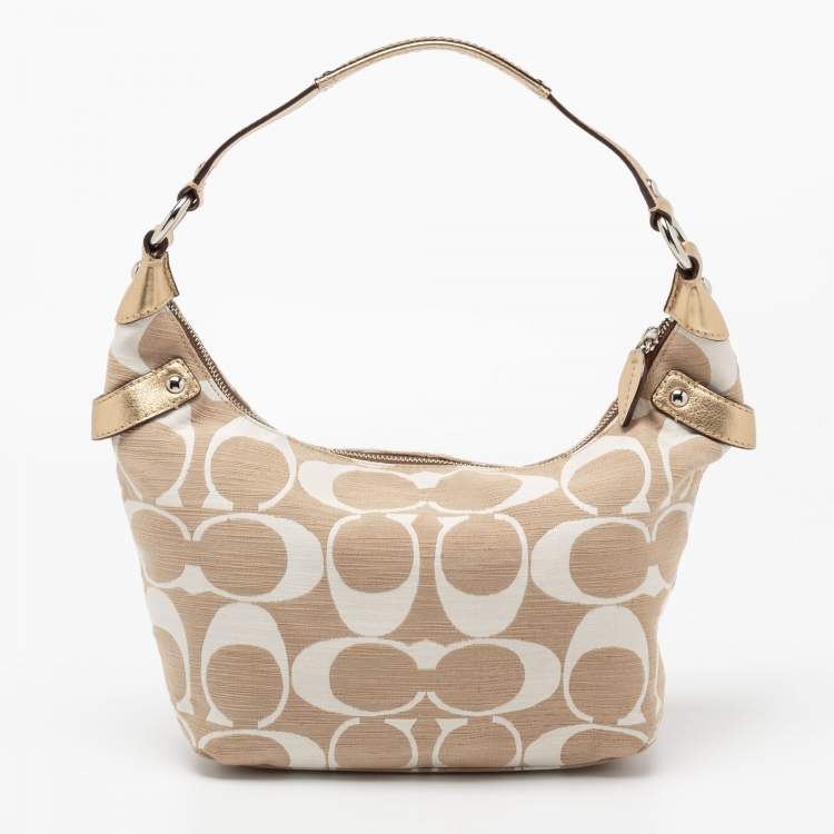 Pre Owned Coach Beige/White Signature Canvas Penelope Hobo