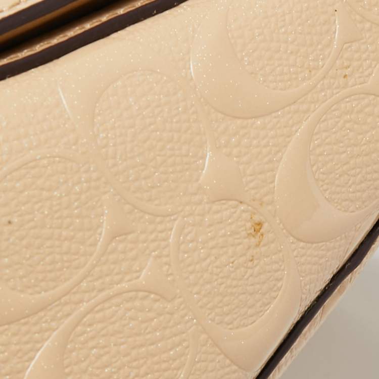 مملوكة مسبقًا Coach Beige Leather Turn Lock Crossbody Bag