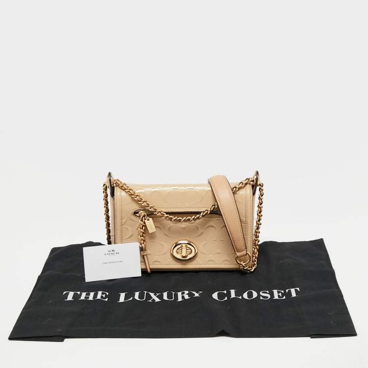 مملوكة مسبقًا Coach Beige Leather Turn Lock Crossbody Bag