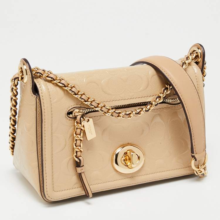 مملوكة مسبقًا Coach Beige Leather Turn Lock Crossbody Bag