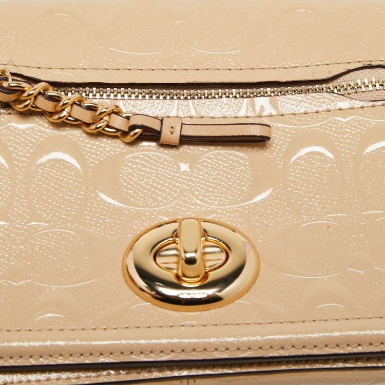 مملوكة مسبقًا Coach Beige Leather Turn Lock Crossbody Bag