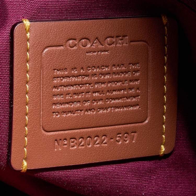 Pre Owned Coach Burnt Orange/Beige Coated Canvas and Leather Shay Shoulder Bag
