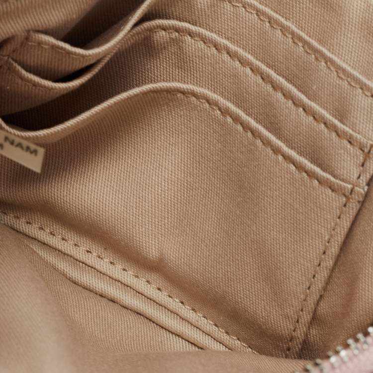 Pre Owned Coach White/Beige Leather Wristlet