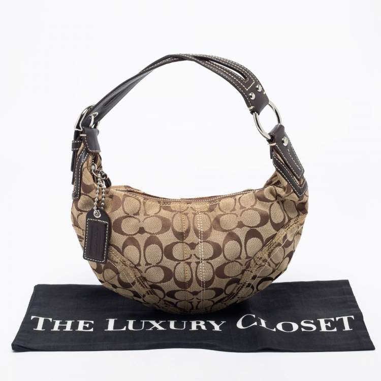 Pre Owned Coach Beige/Brown Signature Canvas and Leather Soho Hobo