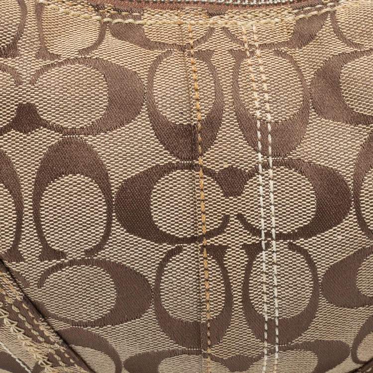 Pre Owned Coach Beige/Brown Signature Canvas and Leather Soho Hobo