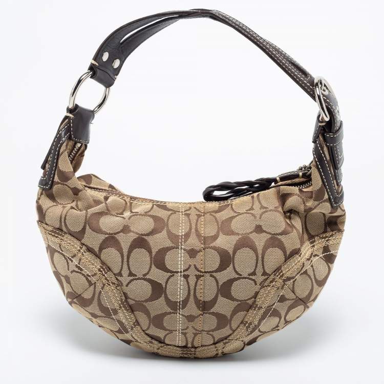 Pre Owned Coach Beige/Brown Signature Canvas and Leather Soho Hobo