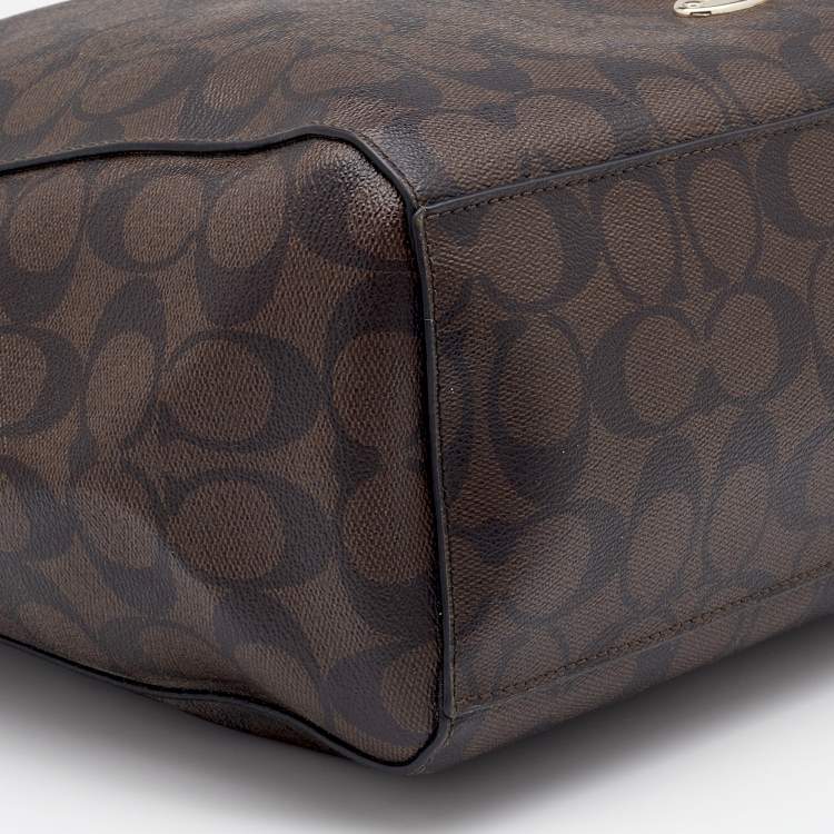 Pre Owned Coach Brown/Black Signature Canvas and Leather Celeste Hobo