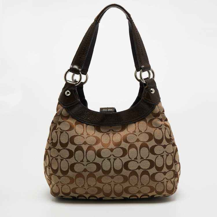 Pre Owned Coach Beige/Brown Signature Canvas and Leather Soho Lynn Hobo
