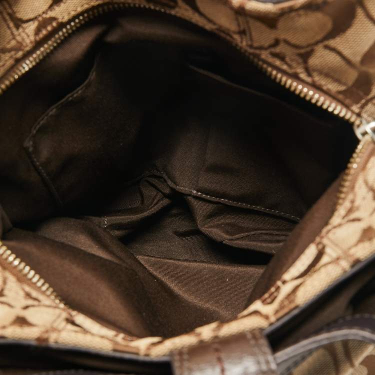 Pre Owned Coach Beige/Brown Signature Canvas and Leather Soho Lynn Hobo