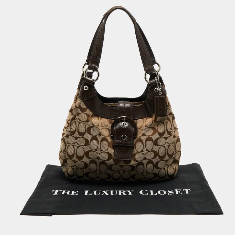 Pre Owned Coach Beige/Brown Signature Canvas and Leather Soho Lynn Hobo