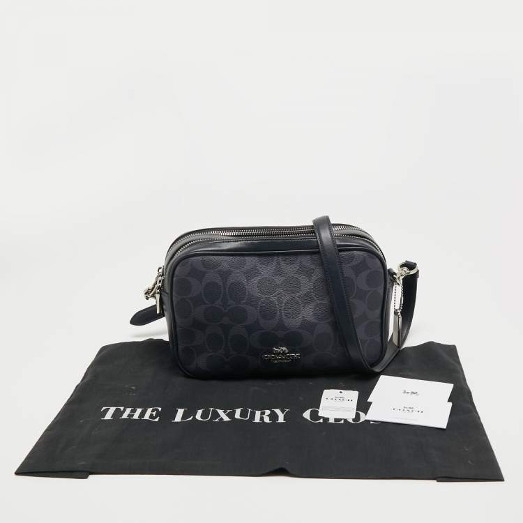 Pre Owned Coach Navy Blue Signature Coated Canvas and Leather Jes Camera Crossbody Bag