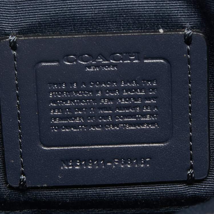 Pre Owned Coach Navy Blue Signature Coated Canvas and Leather Jes Camera Crossbody Bag