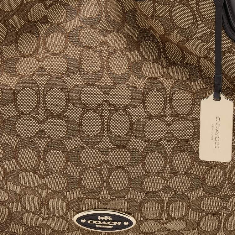 Pre Owned Coach Beige/Brown Signature Canvas and Leather Edie Shoulder Bag