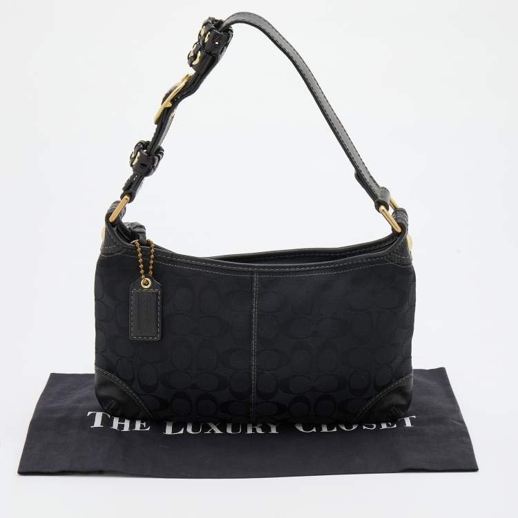 Pre Owned Coach Black Signature Canvas and Leather Buckle Baguette
