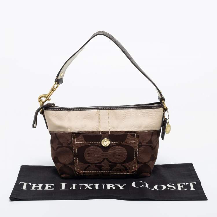 مملوكة مسبقًا Coach Brown/Beige Signature Canvas Front Pocket Baguette Bag