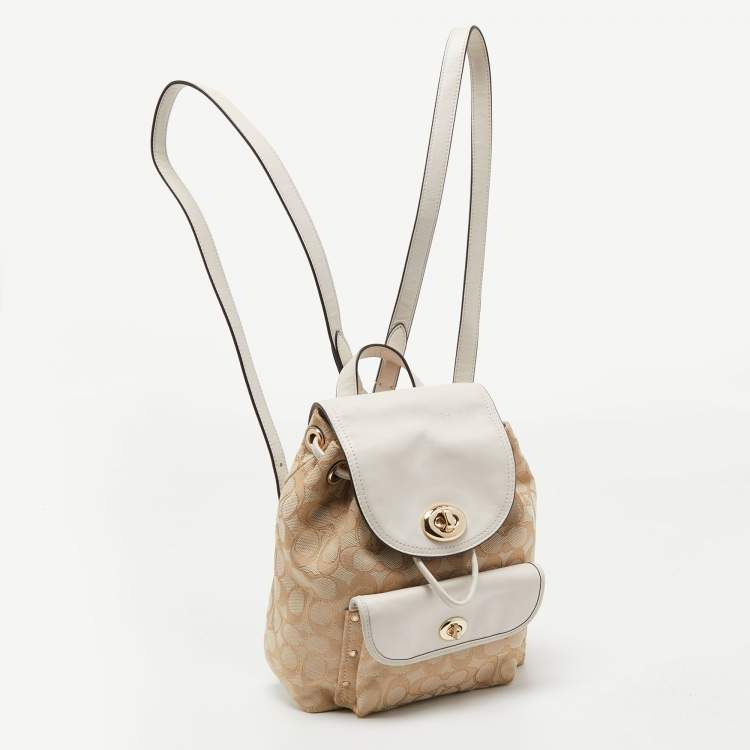 Pre Owned Coach Beige/Cream Signature Canvas and Leather Backpack
