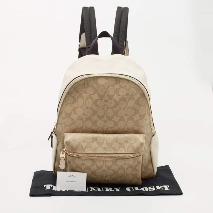 Pre Owned Coach Beige/Cream Signature Coated Canvas and Leather Charlie Backpack