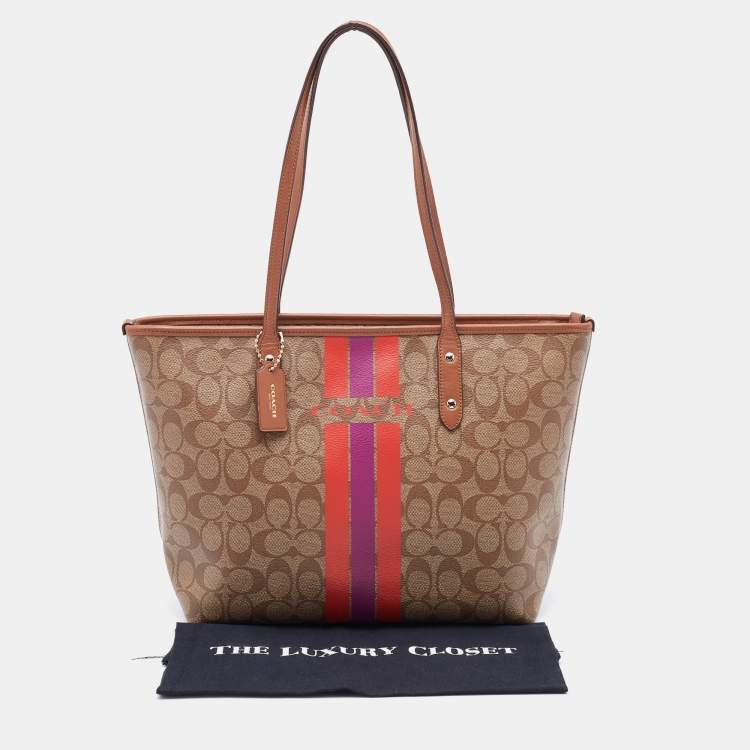 Pre Owned Coach Beige/Brown Signature Coated Canvas and Leather City Tote