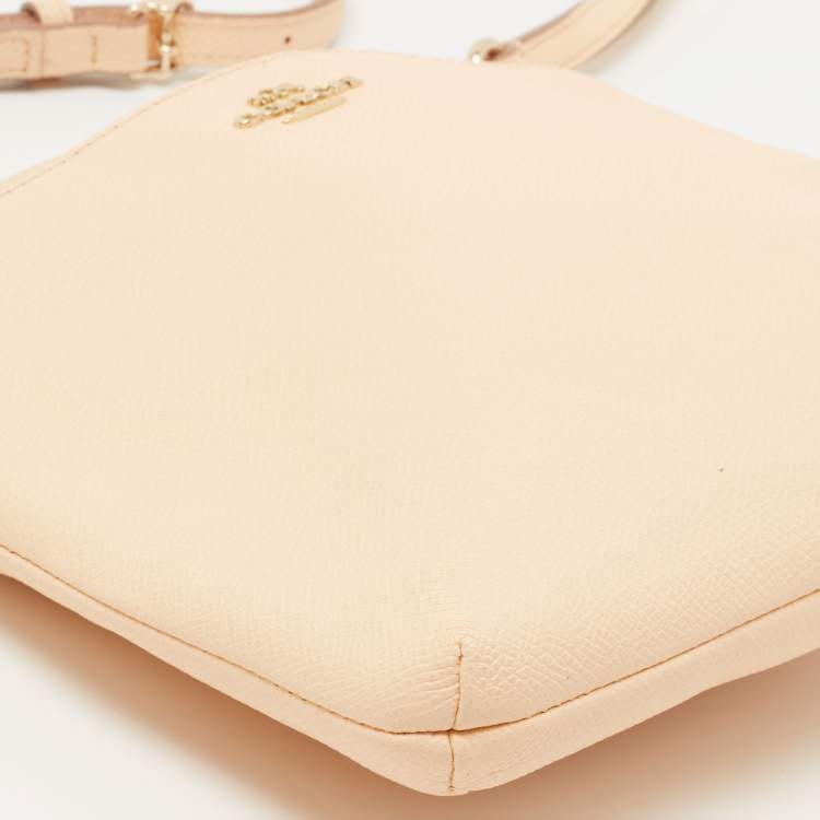 مملوكة مسبقًا Coach Peach Leather North South Swingpack Crossbody Bag