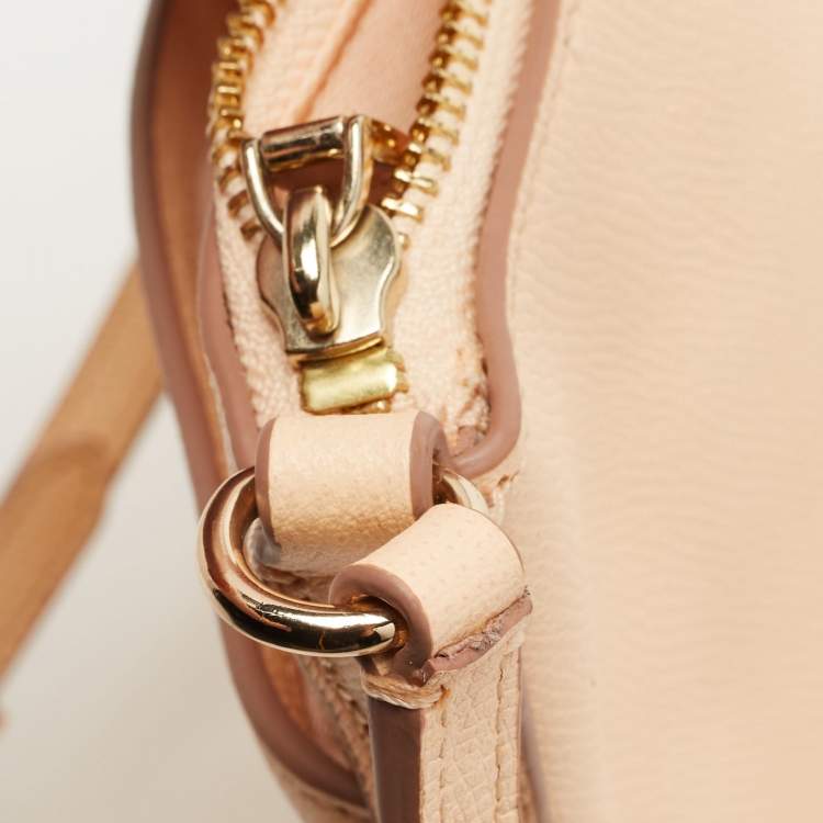 مملوكة مسبقًا Coach Peach Leather North South Swingpack Crossbody Bag