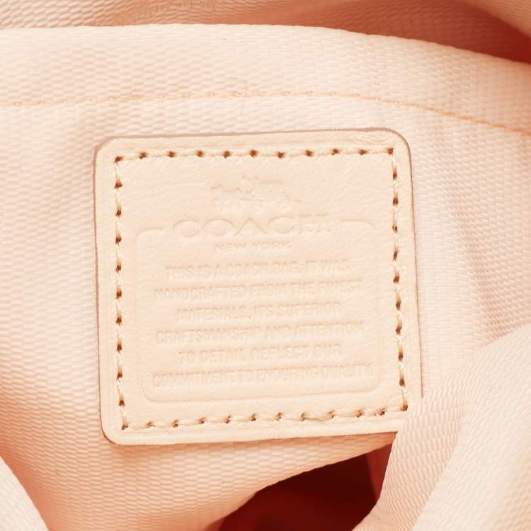 مملوكة مسبقًا Coach Peach Leather North South Swingpack Crossbody Bag