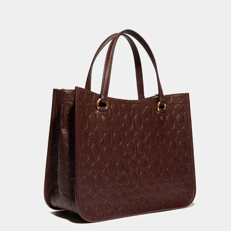 Burgundy coach best sale tote bag