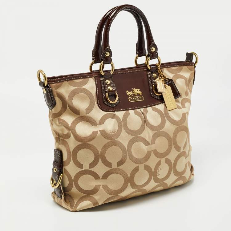 Pre Owned Coach Beige/Brown Op Art Canvas and Patent Leather Julianne Hobo  