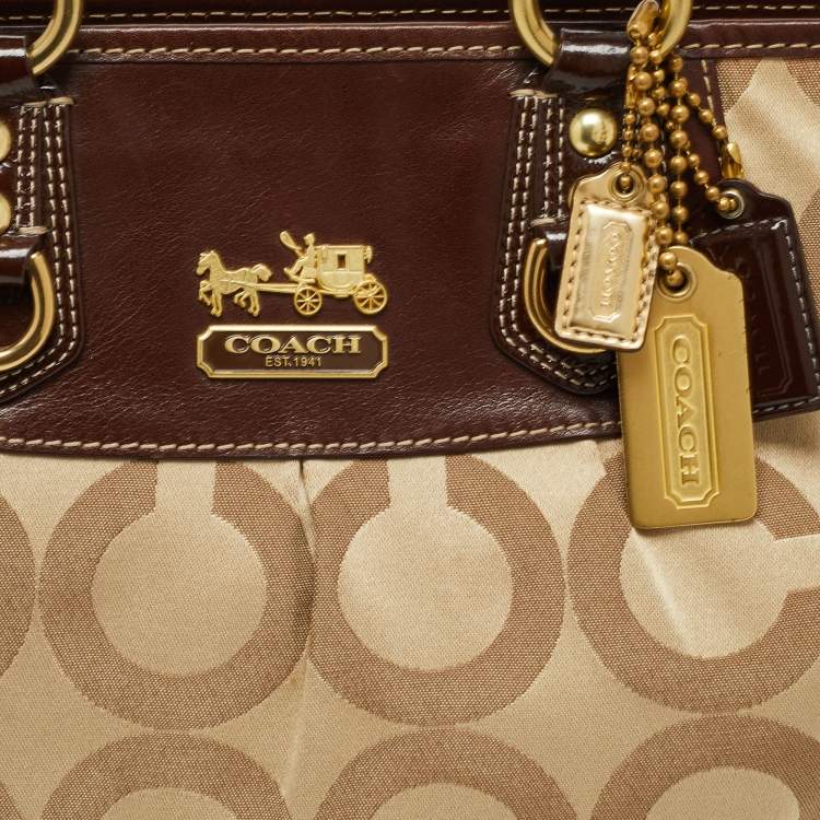 Pre Owned Coach Beige/Brown Op Art Canvas and Patent Leather Julianne Hobo  
