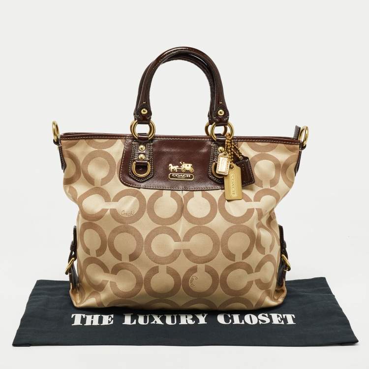 Pre Owned Coach Beige/Brown Op Art Canvas and Patent Leather Julianne Hobo  