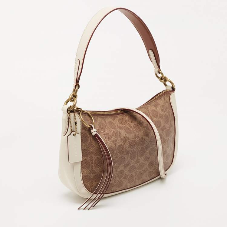 Pre Owned Coach Beige/Cream Signature Coated Canvas and Leather Sutton Hobo