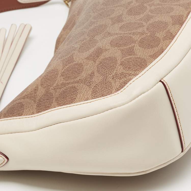 Pre Owned Coach Beige/Cream Signature Coated Canvas and Leather Sutton Hobo