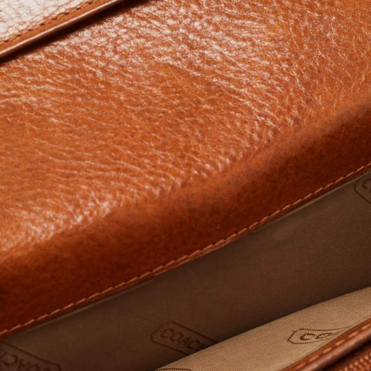 Pre Owned Coach Brown Signature Canvas and Leather Buckle Flap Wallet