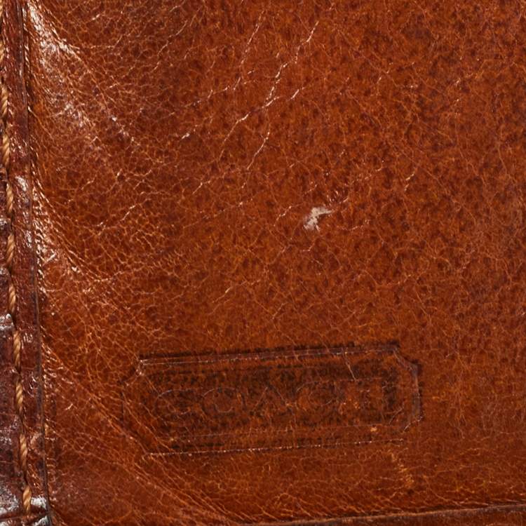 Pre Owned Coach Brown Signature Canvas and Leather Buckle Flap Wallet