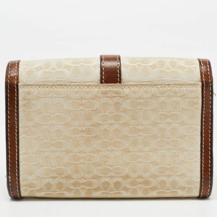 Pre Owned Coach Brown Signature Canvas and Leather Buckle Flap Wallet