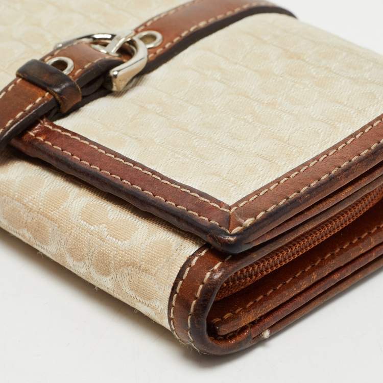 Pre Owned Coach Brown Signature Canvas and Leather Buckle Flap Wallet
