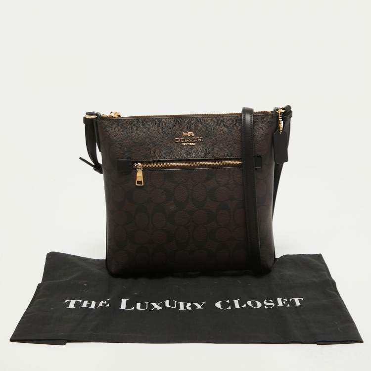 Pre Owned Coach Brown Signature Coated Canvas and Leather Rowan Messenger Bag