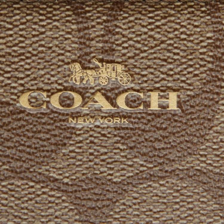 مملوكة مسبقًا Coach Beige Signature Coated Canvas and Leather Double Zip Wristlet Pouch