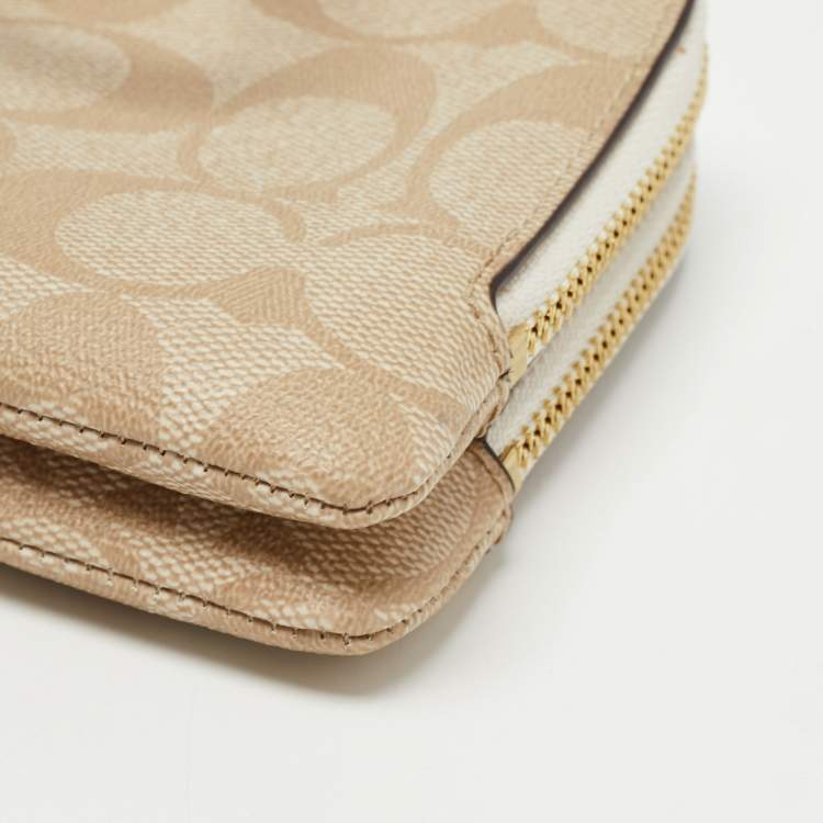 Pre Owned Coach Beige Signature Coated Canvas and Leather Double Zip Wristlet Pouch