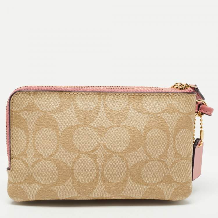 Pre Owned Coach Beige/Pink Signature Coated Canvas and Leather Double Zip Wristlet Pouch