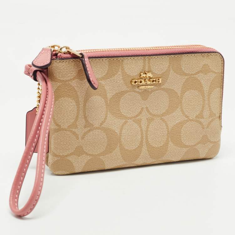 Pre Owned Coach Beige/Pink Signature Coated Canvas and Leather Double Zip Wristlet Pouch
