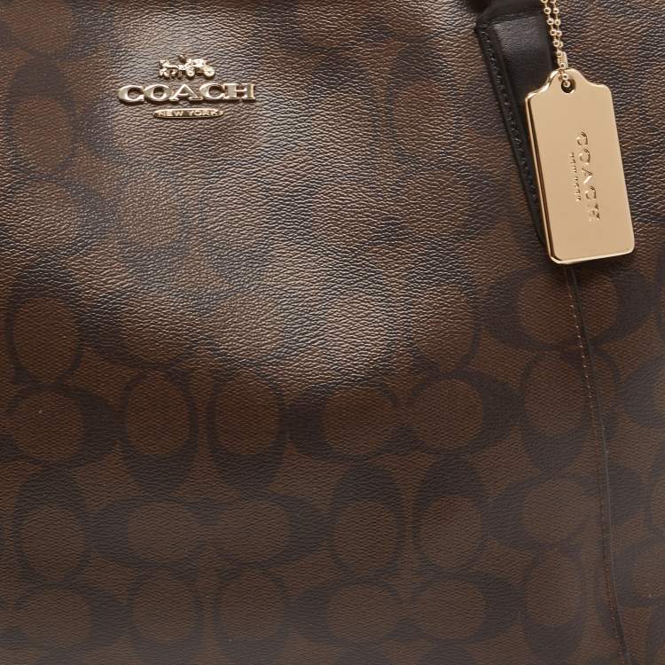 Pre Owned Coach Brown Signature Coated Canvas Ava Tote