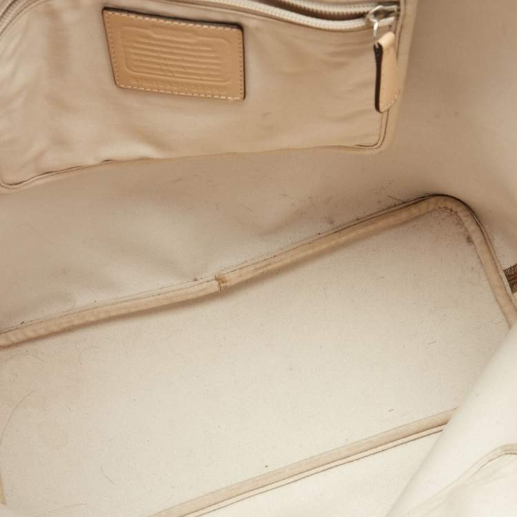 Pre Owned Coach Beige Signature Coated Canvas Park Metro Shopper Tote