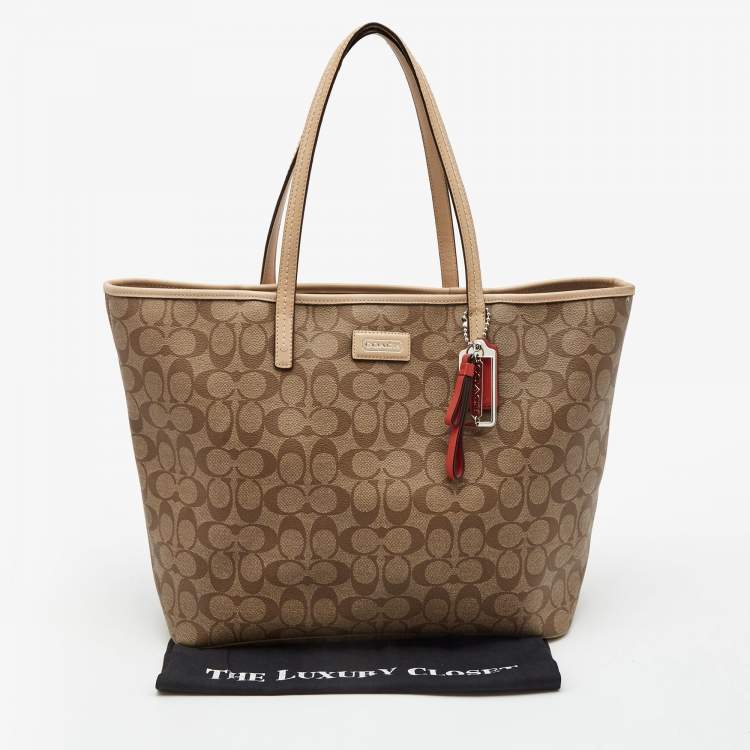 Pre Owned Coach Beige Signature Coated Canvas Park Metro Shopper Tote