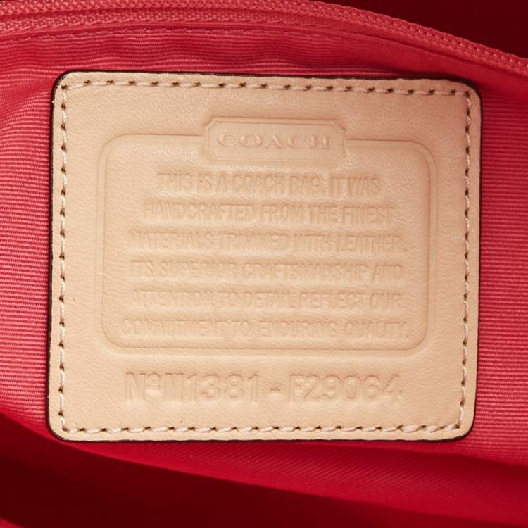 Pre Owned Coach Beige/Pink Signture Coated Canvas and Leather Striped Drawstring Tote