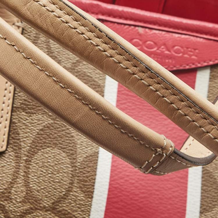 Pre Owned Coach Beige/Pink Signture Coated Canvas and Leather Striped Drawstring Tote