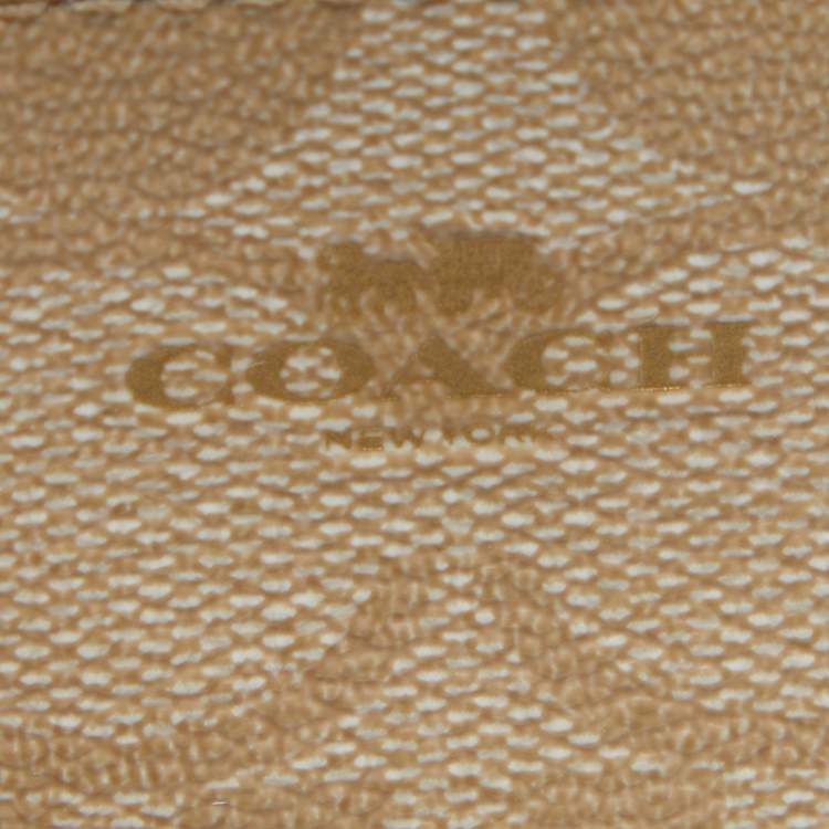Pre Owned Coach Beige/Pink Signature Coated Canvas and Leather Zip Card Holder